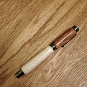 Unique handmade pen made from Rosewood and Ash